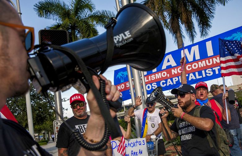 FILE — Proud Boys members and other Trump supporters rally outside a Democratic presidential primary debate in Miami, June 26, 2019. A concerted effort by the far-right nationalist Proud Boys group to join the leadership of the party — and, in some cases, run for local office — has destabilized and dramatically reshaped the Miami-Dade Republican Party. (Scott McIntyre/The New York Times)