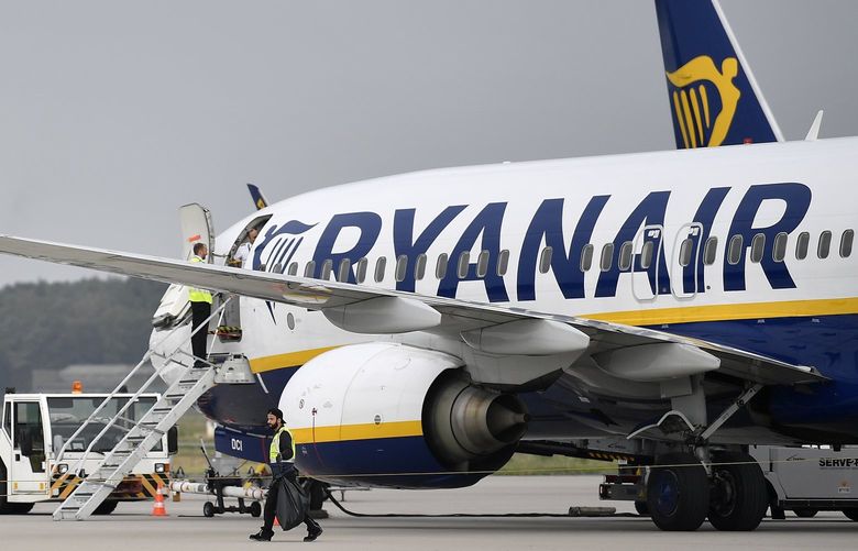 FILE – A Ryanair plane parks at the airport in Weeze, Germany, Sept. 12, 2018. (AP Photo/Martin Meissner, File) 