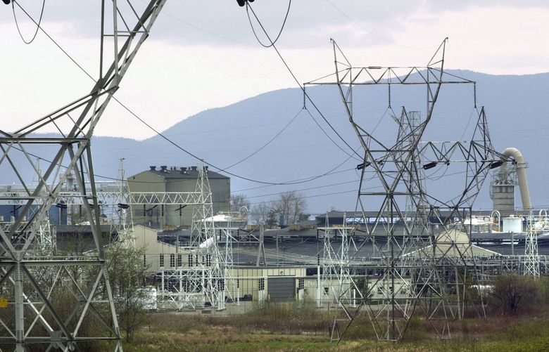 Bonneville Power Administration high-voltage transmission lines lead to the Alcoa Intalco Works in Ferndale, Whatcom County, on April 9, 2001. (AP Photo / Bellingham Herald, Pete Kendall, 2001)
