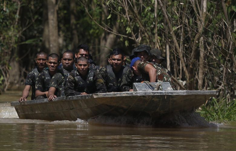 Army soldiers navigate a river during the search for Indigenous expert Bruno Pereira and freelance British journalist Dom Phillips in Atalaia do Norte, Amazonas state, Brazil, Tuesday, June 14, 2022. The search for Pereira and Phillips, who disappeared in a remote area of Brazil’s Amazon continues following the discovery of a backpack, laptop and other personal belongings submerged in a river. (AP Photo/Edmar Barros) XSI108 XSI108
