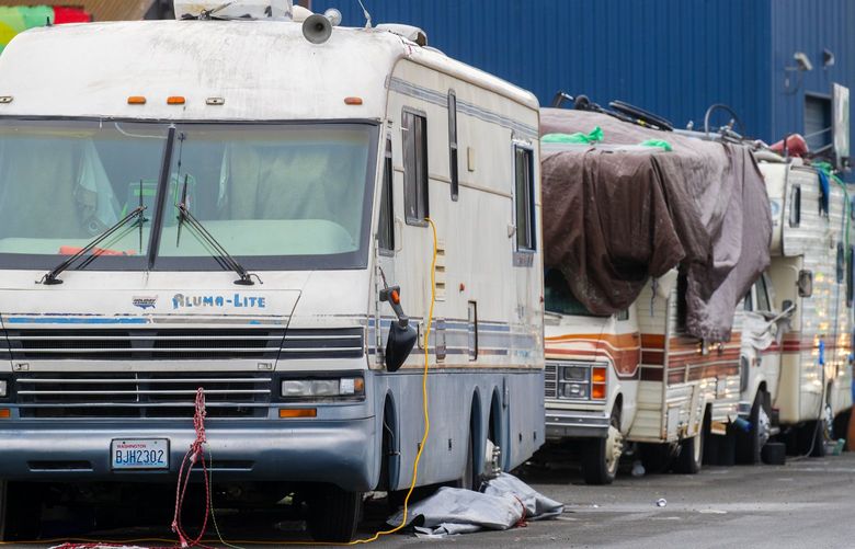 A city of Seattle program that pumps solid waste tanks for RVs of homeless campers, works along 3rd Avenue South near South Walker Street in downtown Seattle. The program reduces the number of illegal spills in Seattle’s streets.
Photographed on November 24, 2020. 215735