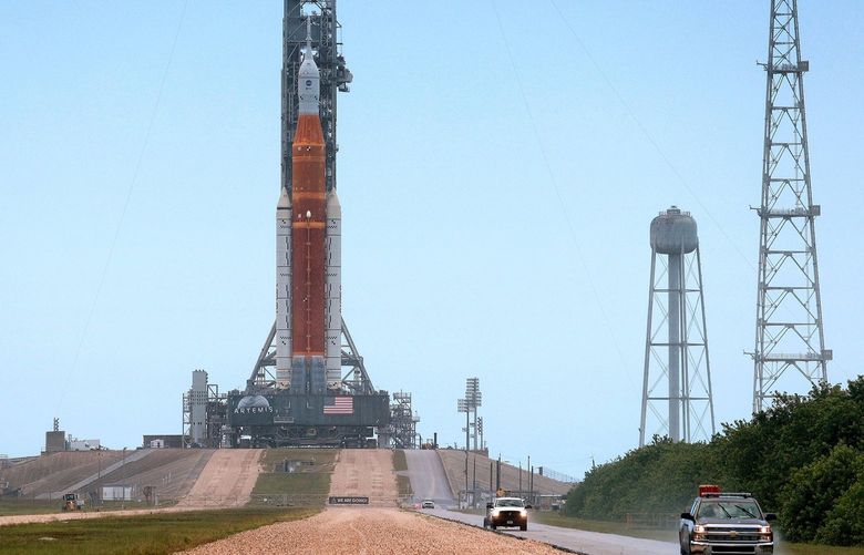 After completing its second rollout overnight Sunday, Artemis 1, the NASA moonshot rocket, stands at launch pad 39-B at Kennedy Space Center, Florida, Monday, June 6, 2022. (Joe Burbank/Orlando Sentinel/TNS)