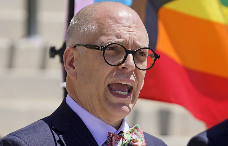 Jim Obergefell, left, speaks during a news conference as Utah Sen. Derek Kitchen, D-Salt Lake City, right, looks on Tuesday, June 7, 2022, in Salt Lake City. As the nation awaits a decision from the U.S. Supreme Court regarding a Mississippi law that calls for banning abortion after 15 weeks, LGBTQ advocates are pushing to codify protections for same-sex marriage in states throughout the country. “We need states across this country to say we see you, you exist. You deserve respect. You deserve protections, because your relationship is no different than any other,” said Obergefell, the plaintiff in the landmark 2015 case who is now running for the statehouse in Ohio. (AP Photo/Rick Bowmer) UTRB107 UTRB107
