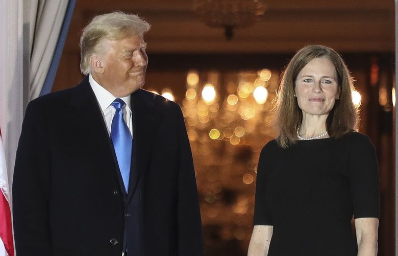 FILE — President Donald Trump and Supreme Court Justice Amy Coney Barrett during Barrett’s swearing-in ceremony at the White House in Washington, on Monday, Oct. 26, 2020. Publicly, Trump had been remarkably tight-lipped about a reversal of Roe v. Wade — but privately, he worried the decision could lead to a backlash in the midterms.(Oliver Contreras/The New York Times) XNYT138 XNYT138