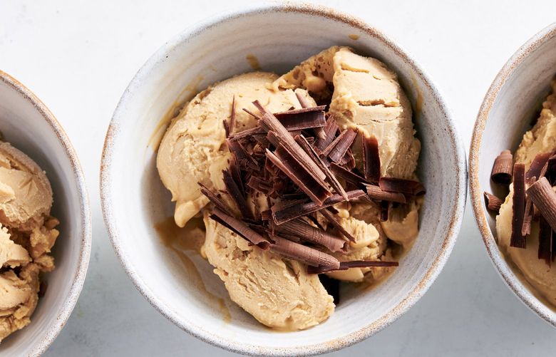 Peanut butter, maple syrup, oat creamer, a dash of salt and vanilla go into the recipe for Easy Vegan Peanut Butter-Maple Ice Cream, in New York, June 7, 2022. This four-ingredient, easy vegan treat is ready to be the star of your summer. Food Stylist: Simon Andrews. (David Malosh/The New York Times) XNYT216 XNYT216