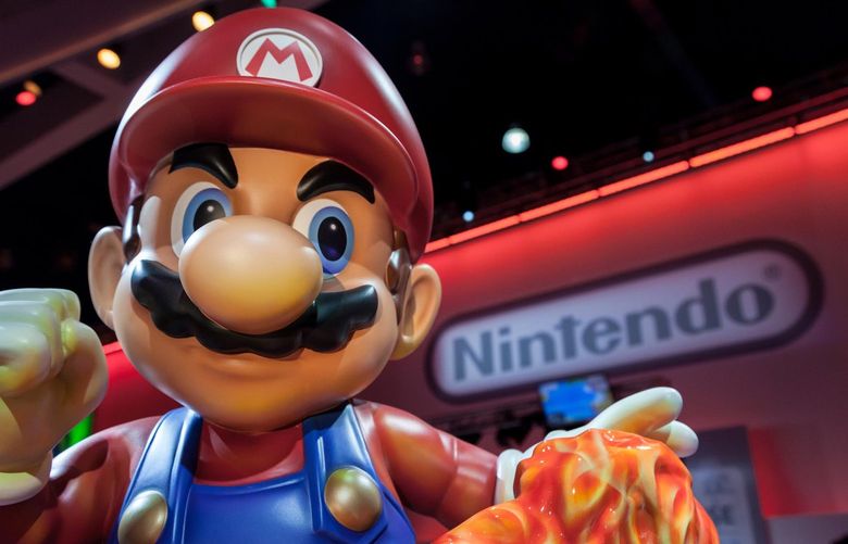 A Super Mario statue reps for Nintendo at a 2014 Los Angeles video game expo. (Dreamstime/TNS)