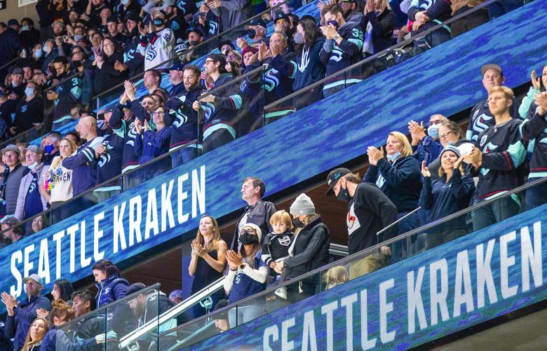 Kraken fans celebrate the team’s first goal scored at Climate Pledge Arena Saturday.
.
The Vancouver Canucks played the Seattle Kraken in the first game ever played at Climate Pledge Arena, Saturday, Oct 23, 2021. 218546 218546