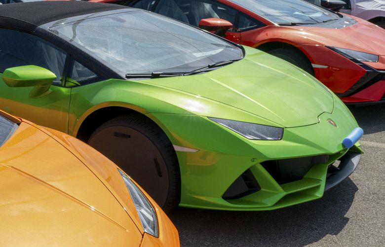 New cars parked at Laborgini’s factory in Sant’Agata Bolognese, Italy, on June 8, 2022. Ferrari and Lamborghini are trying to design battery-powered cars that inspire the same devotion as their costly internal combustion models. (Federico Borella/The New York Times)