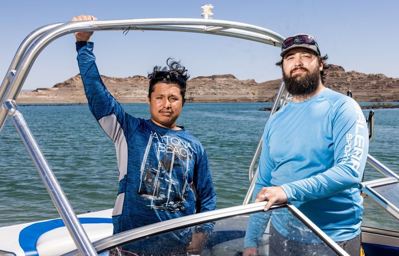 From left, special-education teachers Shawn Rosen, 31, and Matthew Blanchard, 31, at Lake Mead on June 14 in Boulder City, Nev. MUST CREDIT: Photo for The Washington Post by Roger Kisby