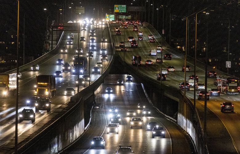 A steady stream of cars drive north and south on Interstate 5 around 6 p.m. on Tuesday, Feb. 22, 2022. Traffic has almost reached its previous aggravating volumes since before the pandemic started. 

*Do not use, photo for covid anniversary*
