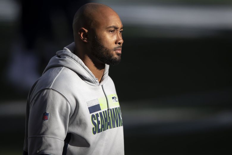 Seattle Seahawks linebacker K.J. Wright walks on the field Tuesday