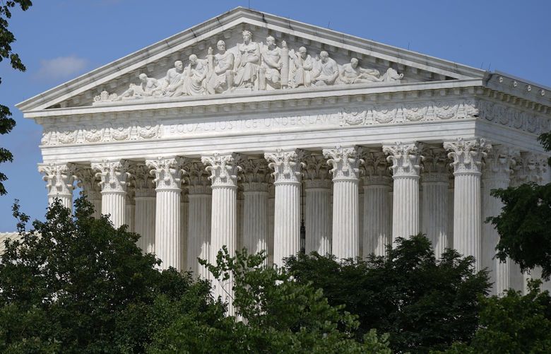 FILE – The U.S. Supreme Court building on Capitol Hill in Washington, June 9, 2022. (AP Photo/Patrick Semansky, File) WX201 WX201