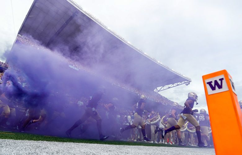 Husky Stadium – University of Washington Huskies vs. Montana Gizzlies – Pac-12 football 090421

The Washington Huskies run out onto the field before the start of a game against the Montana Grizzlies Saturday, Sept. 4, 2021, in Seattle, Wash. 218127