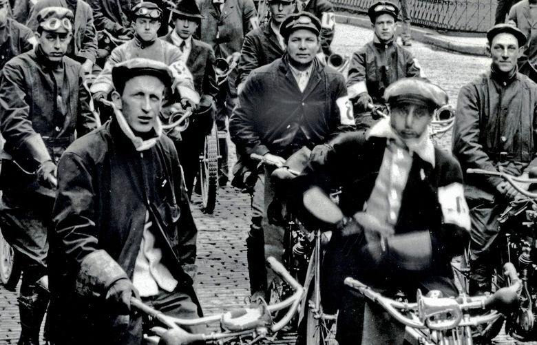 THEN 2 (Possible on-line only): Motorcycle club members rendezvous at 7 a.m. on July 3, 1910, near Pioneer Square. Credit: Courtesy Museum of History & Industry
