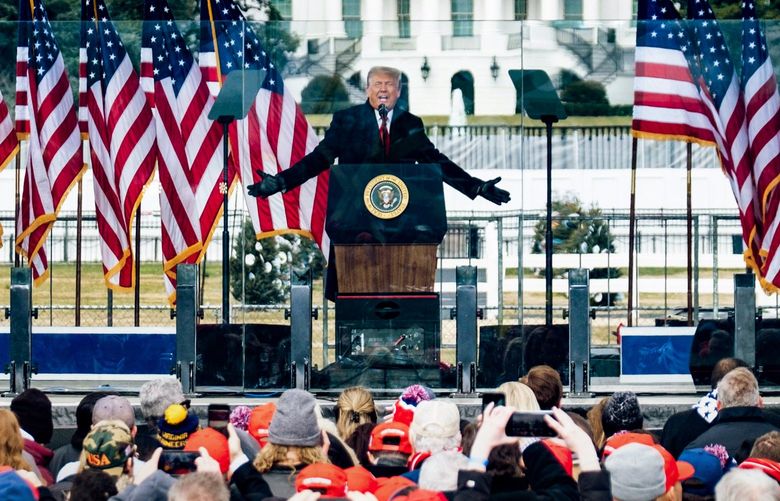 President Donald Trump addresses a rally on the Ellipse, with the White House in the background, in Washington on Wednesday, Jan. 6, 2021, protesting the presidential election results. As angry Trump supporters massed in the capital and a futile challenge to President-elect Joe Biden’s victory unfolded in Congress, the president most likely succeeded in handed Washington to the Democrats. (Pete Marovich/The New York Times)