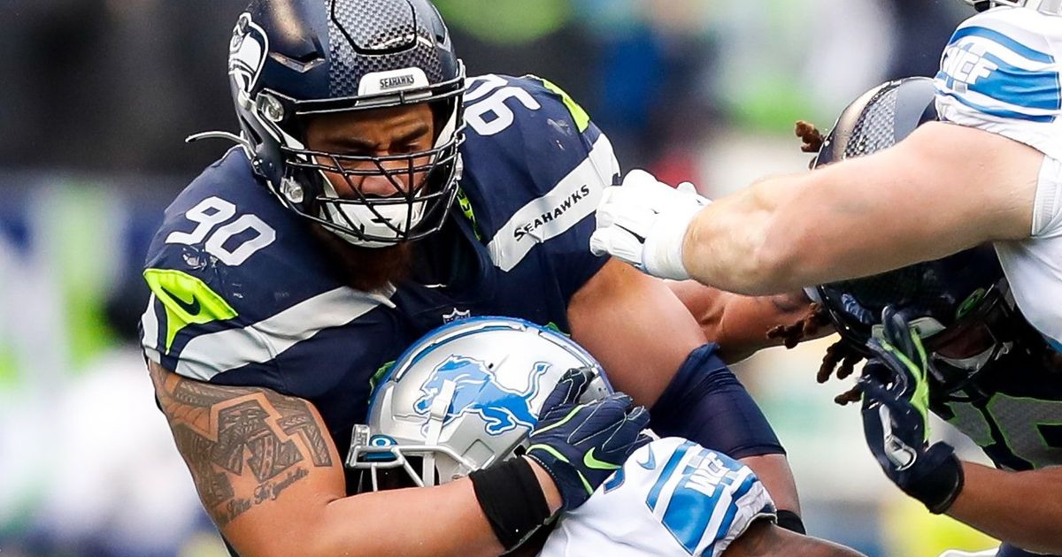 August 26 2022: Seattle Seahawks defensive tackle Bryan Mone (90) losses  his helmet during the 2nd half the NFL Football game between the Seattle  Seahawks and Dallas Cowboys at AT&T Stadium in