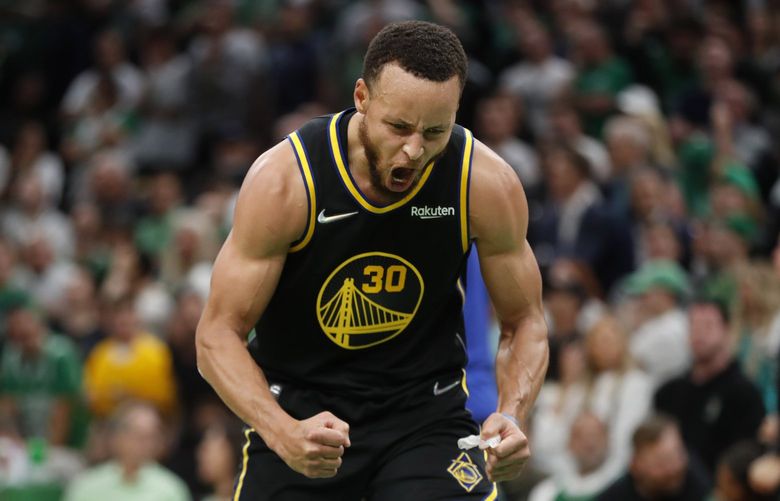 Golden State Warriors’ Stephen Curry (30) reacts after scoring a basket late in the fourth quarter of a 107-97 victory over the Boston Celtics in Game Four of the NBA Finals on Friday, June 10, 2022, at TD Garden in Boston. (Karl Mondon/Bay Area News Group/TNS) 50394803W 50394803W