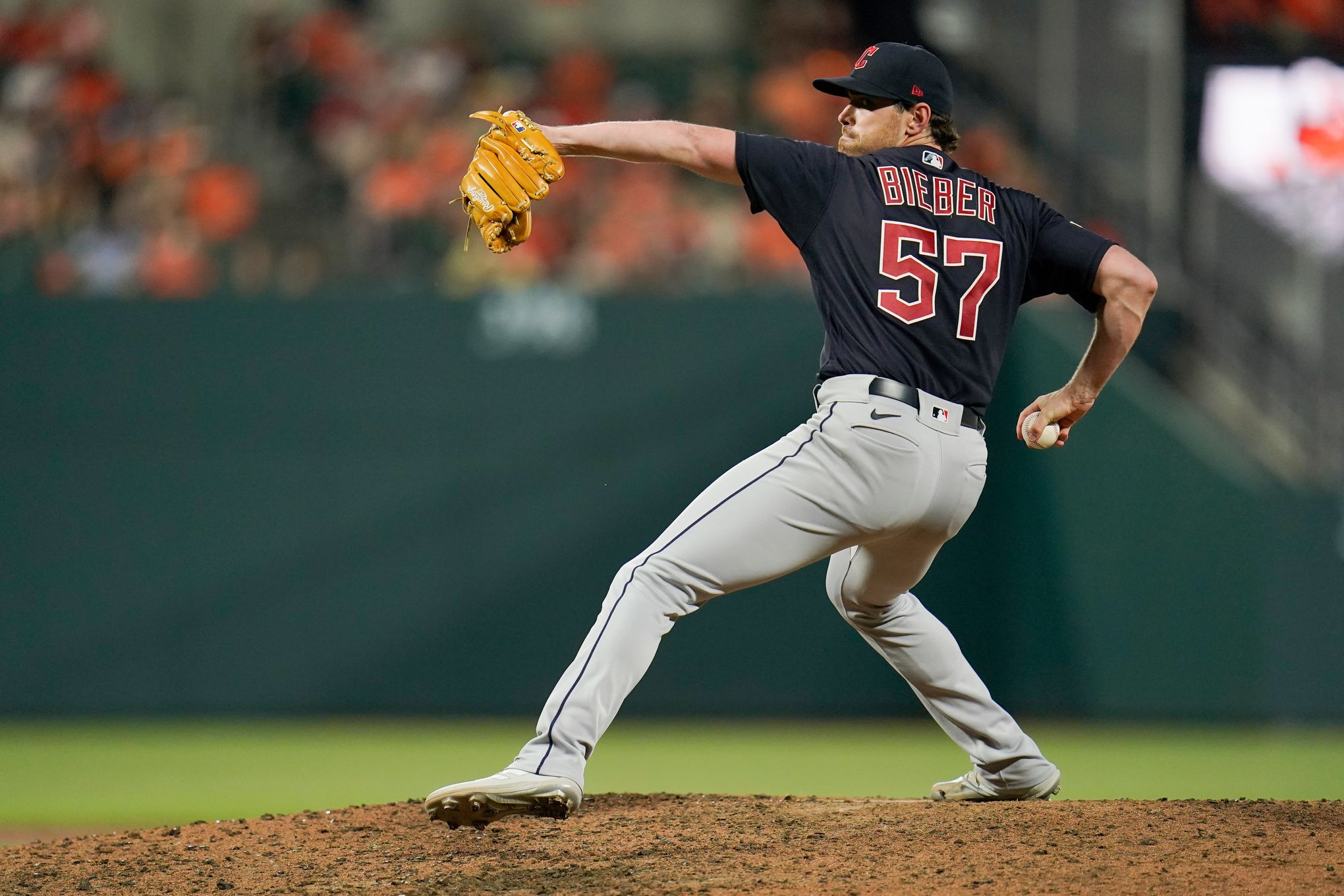 Cleveland Guardians pitcher Shane Bieber (57) pitches the ball