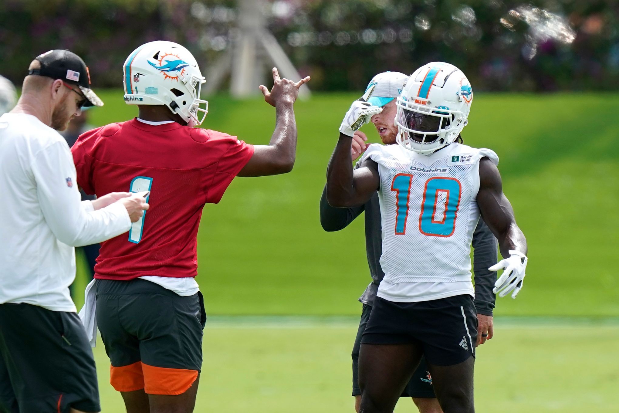 Miami Dolphins wide receiver Tyreek Hill (10) stands on the field