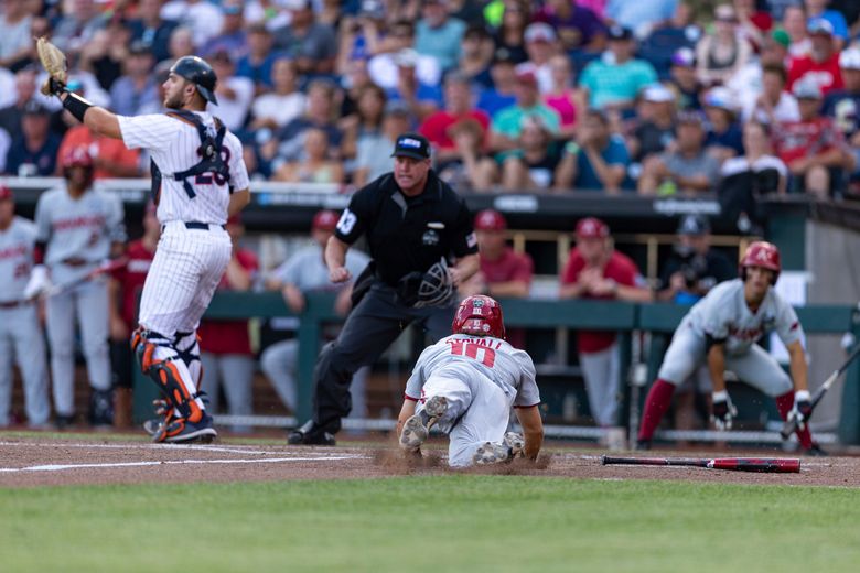 Who are Arkansas vs. NC State baseball umpires in Saturday's NCAA game