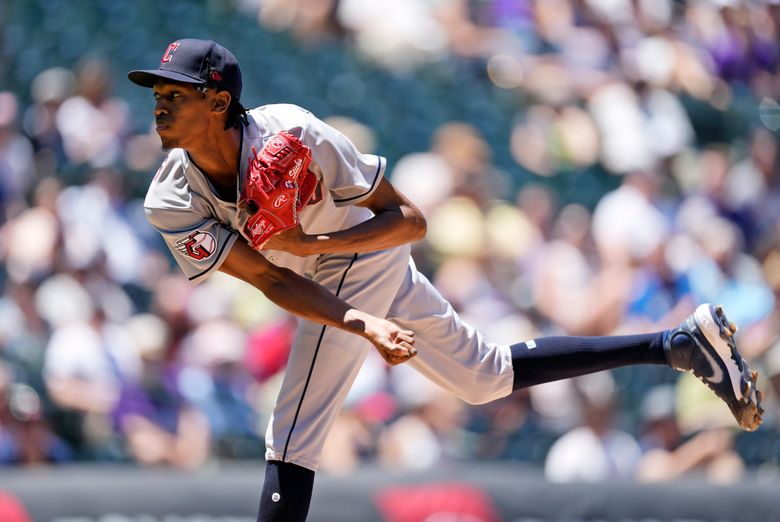 Russell Wilson, Peyton Manning at MLB batting practice with Rockies