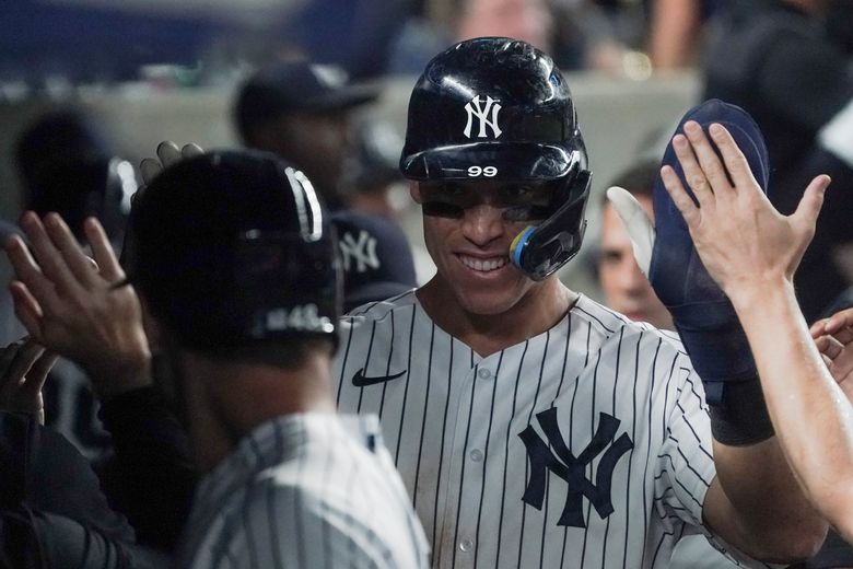 Josh Donaldson of the New York Yankees jogs to the dugout after