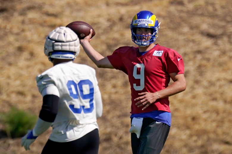 Matthew Stafford throws passes in Rams' camp practice opener