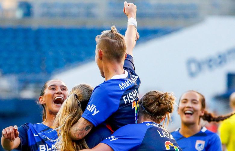 Lumen Field – OL Reign vs. NC Courage – 070122
OL Reign midfielder Jess Fishlock celebrates her goal during the second half Friday, July 1, 2022 in Seattle, Wash. 220880 220880