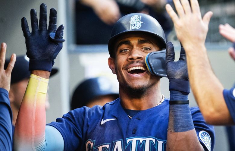 Julio Rodriguez is back in the dugout after homering in the third inning.

The Oakland Aís played the Seattle Mariners in Major League Baseball Thursday, June 30, 2022 at T-Mobile Park, in Seattle, WA. 220845