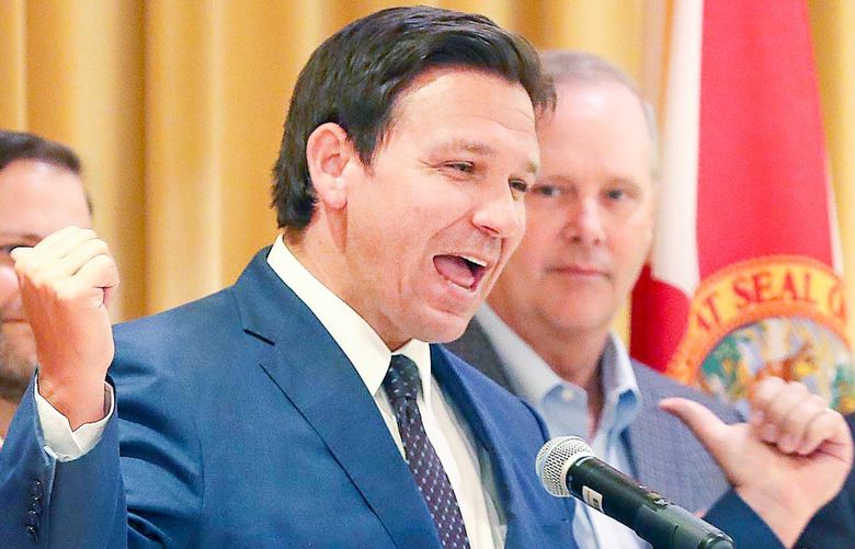 Florida Gov. Ron DeSantis speaks before he signs the state budget at The Villages, Florida, on June 2, 2022. (Stephen M. Dowell/Orlando Sentinel/TNS) 51067165W