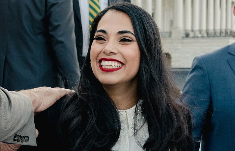 — EMBARGO: NO ELECTRONIC DISTRIBUTION, WEB POSTING OR STREET SALES BEFORE 5:01 A.M. ET ON WEDNESDAY, JULY 6, 2022. NO EXCEPTIONS FOR ANY REASONS — Rep. Mayra Flores (R-Texas) with lawmakers and her daughters at the steps of the Capitol in Washington, on June 21, 2022. Flores, the first Republican Latina Texas has ever sent to Congress, is one of three Republican Latinas vying to transform South Texas politics by shunning moderates and often embracing the extreme. (Shuran Huang/The New York Times) XNYT136 XNYT136