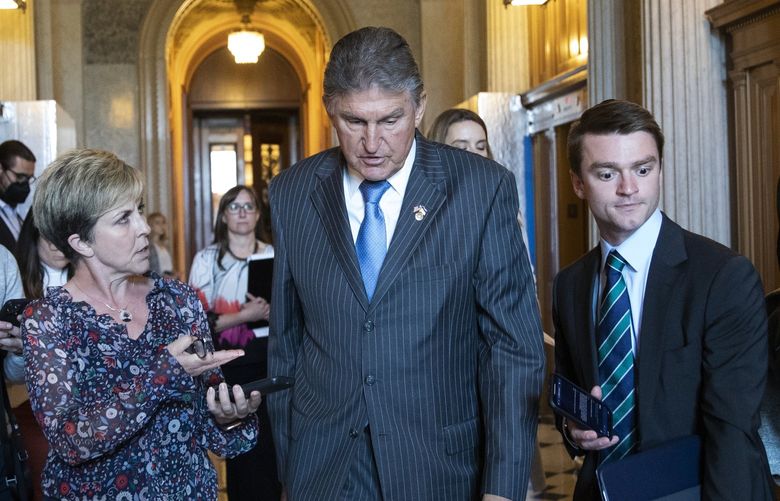 FILE — Sen. Joe Manchin (D-W.Va.) speaks to reporters following a vote on Capitol Hill in Washington, May 25, 2022. Top Senate Democrats on Wednesday, July 6 released an updated plan aimed at lowering the cost of prescription drugs, signaling progress on a crucial piece of their bid to salvage some of President Joe Biden’s stalled social safety net, climate and tax bill. XNYT57 XNYT57