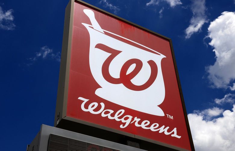 FILE – This June 25, 2019, photo, shows a sign outside a Walgreens Pharmacy in Pittsburgh. (AP Photo/Gene J. Puskar, File) 
