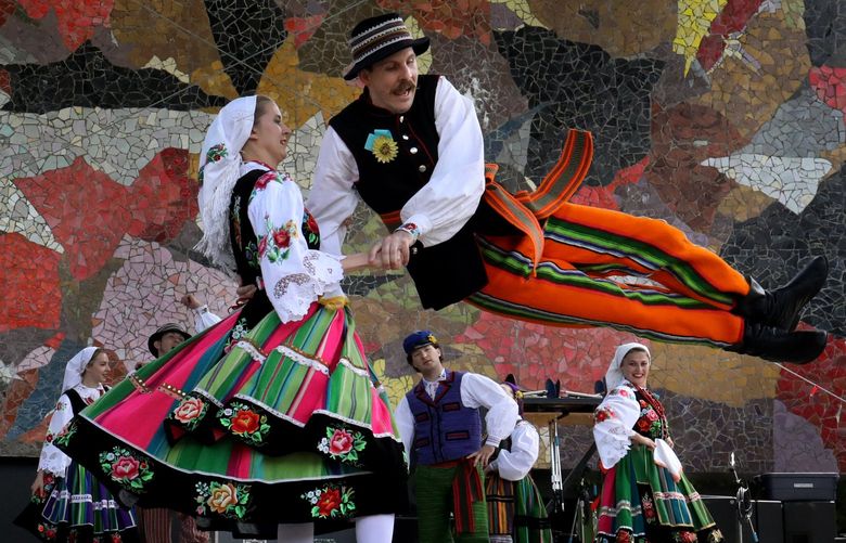 The Lajkonik Polish Folk Ensemble perform traditional dances with dynamic and athletic flourish on the Mural Amphitheatre stage during the Polish Festival on Saturday at Seattle Center.

Ref to more photos online

Saturday July 9, 2022 220956