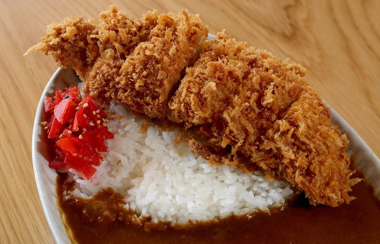 At the new restaurant Kobuta and Ookami on Capitol Hill, they offer Premium free range chicken cutlet with house-made curry served over rice. 220891