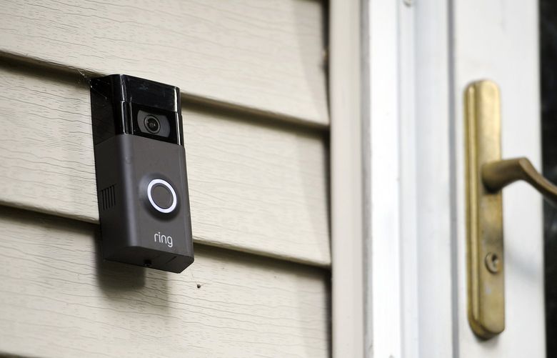 A Ring doorbell camera on a home in Wolcott, Conn., in 2019. (AP Photo/Jessica Hill, File) 