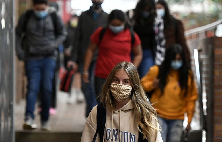 Students make their way to lunch down the main hallway at Steamboat Springs Middle School on Sept. 20, 2021, in Steamboat Springs, Colorado. Schools, like Strawberry Park Elementary School and Steamboat Springs Middle School, are using reduced quarantines this year to keep kids in school. Steamboat Springs has signed up to participate in the state’s testing program. The district, which has seen as many cases of COVID-19 in its schools in the past month as it did all of last year as the Delta variant spreads, is keen to do whatever they can to stop the spread. (Helen H. Richardson/The Denver Post/TNS) 53221409W 53221409W