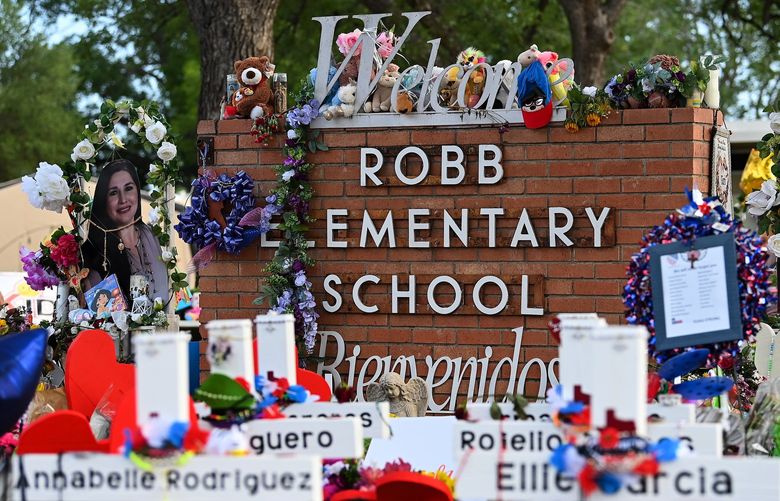 Flowers, messages, balloons, stuff animals, toys and other items were left by mourners to commemorate those killed at Robb Elementary School on May 31 in Uvalde, Texas. MUST CREDIT: Washington Post photo by Joshua Lott.