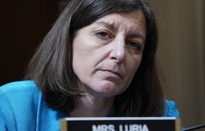 FILE – Rep. Elaine Luria, D-Va., listens as the House select committee investigating the Jan. 6, 2021, attack on the Capitol holds a hearing at the Capitol in Washington, Thursday, June 16, 2022.Â (AP Photo/Susan Walsh, File) WX220 WX220