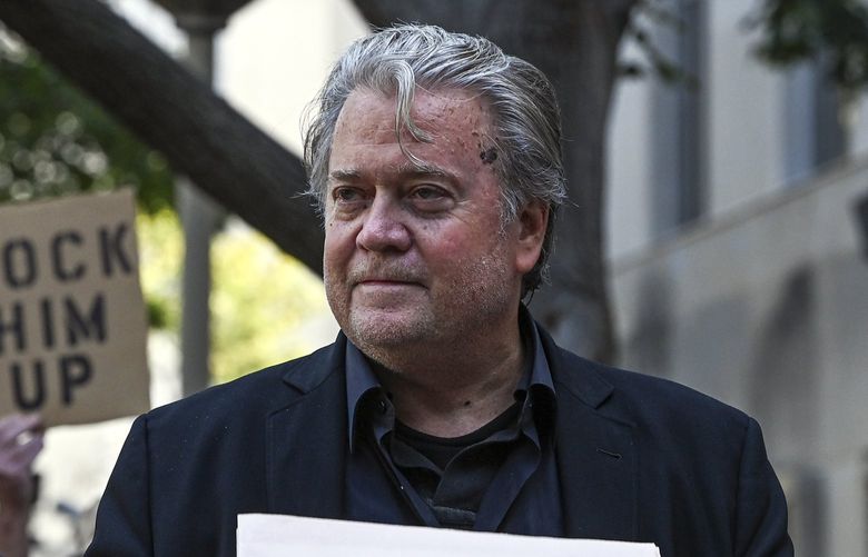 Steve Bannon, a onetime aide to former President Donald Trump, speaks to reporters as he arrives at federal court in Washington for his criminal trial on on two counts of contempt of Congress on Wednesday morning, July 20, 2022. (Kenny Holston/The New York Times) XNYT4 XNYT4
