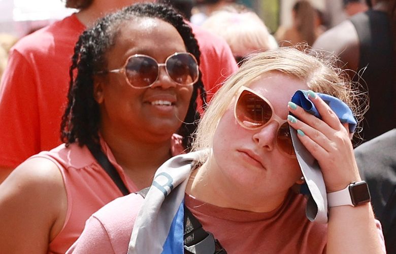 A crowd braves the hot weather at Universal CityWalk in June. According to one survey, Orlando is the “sweatiest city” in all of America. (Stephen M. Dowell/Orlando Sentinel/TNS) 53618469W 53618469W