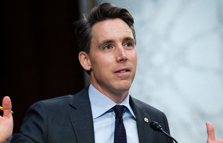 U.S. Sen. Josh Hawley, R-Mo., speaks during a Senate Judiciary Committee hearing to examine Texas’ abortion law on Capitol Hill in Washington, D.C., Sept. 29, 2021. Hawley has been ridiculed for the video showing him running from the Jan. 6 mob in the U.S. Capitol, but he still is raising funds from merchandise highlighting his raised fist motion to the rioters. (Tom Williams/POOL/AFP/Getty Images/TNS) 53844983W 53844983W
