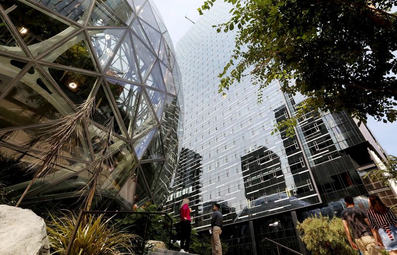 Amazon’s downtown Seattle campus is seen Thursday, Aug. 5, 2021 after the company announced it is pushing back a return to the office for workers until January 2022. 217842