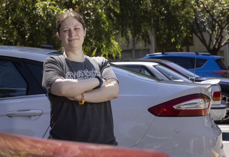 Kayla Haughey, a security officer at Amazon in South Lake Union, commutes daily from her apartment in Kent. Three days a week, she can carpool with her boyfriend and share the high price of gas. On other days, she uses public transit, but that can take three hours. (Ellen M. Banner / The Seattle Times)