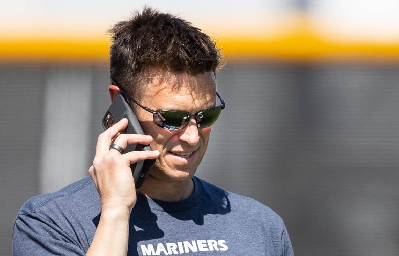 ­SAVE FOR SPECIAL SECTION   General Manager Jerry Dipoto works his cell phone Wednesday at Mariners Spring Training.

The Seattle Mariners Spring Training camp is being held at the Peoria Sports Complex, in Peoria, AZ, March 16, 2022. 219852