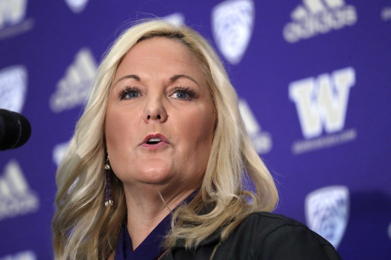 Washington athletic director Jen Cohen speaks during a news conference in 2019. (Elaine Thompson / AP)