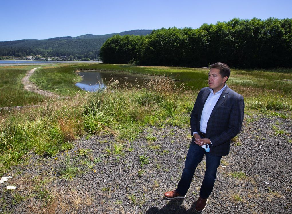 Casey Sixkiller, regional administrator of EPA’s Region 10 office in Seattle, looks out over Sequim Bay, where federal money was used to restore a tribal estuary from its former use as a log yard