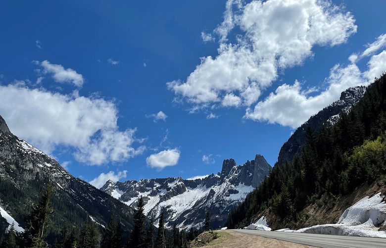 The North Cascades Scenic Byway with mountains in the distance