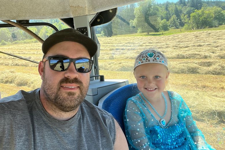 Kevin Jensen and his daughter at work on Riverbend Ranch. (Courtesy of Kevin Jensen)