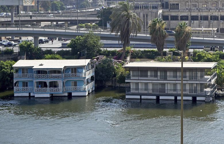 Several houseboats stand moored on the banks of the Nile River in Cairo, Egypt on June 27, 2022. A government push to remove the string of houseboats from Cairo’s Nile banks has dwindled their numbers from a several dozen to just a handful. The tradition of living on the Nile River dates back to the 1800s, and the removal of the boats has drawn criticism in Egypt. The government says it plans to develop the waterfront. (AP Photo/Tarek Wagih) CAIDK711 CAIDK711